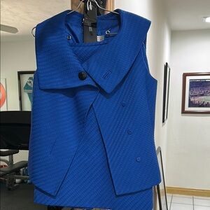Stylish and  Stunning Blue Sleeveless Suit with big black patent leather belt